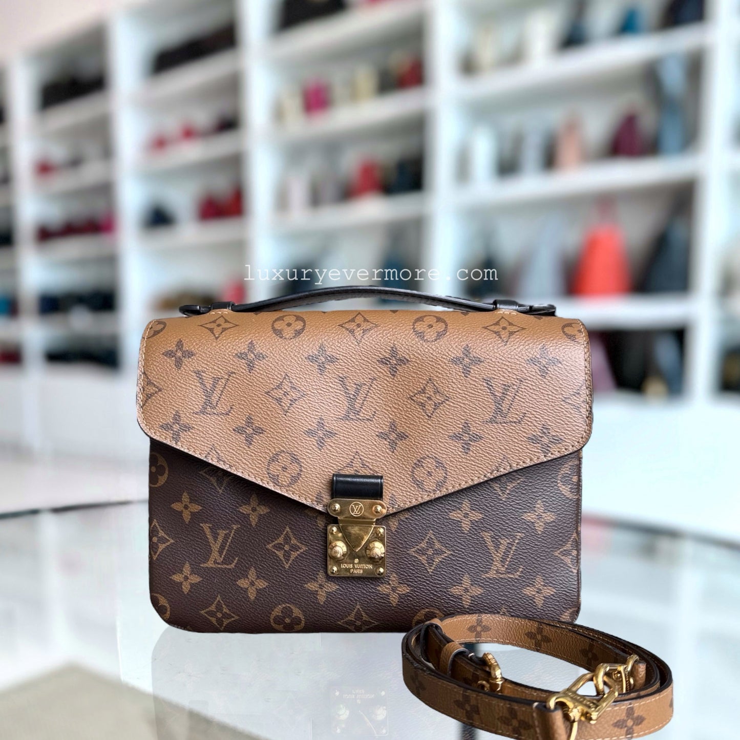 Kovancy Pochette Metis - Toile Monogram inversée Matériel doré