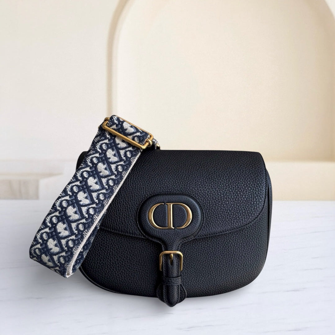 Kovancy Bijou Bobby Large - Cuir caviar noir, finitions dorées, bandoulière