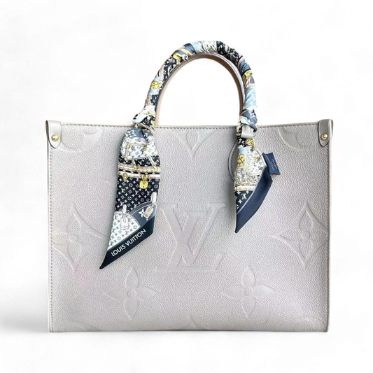 Kovancy OnTheGo MM On The Go Monogram Empreinte Tourterelle Gris