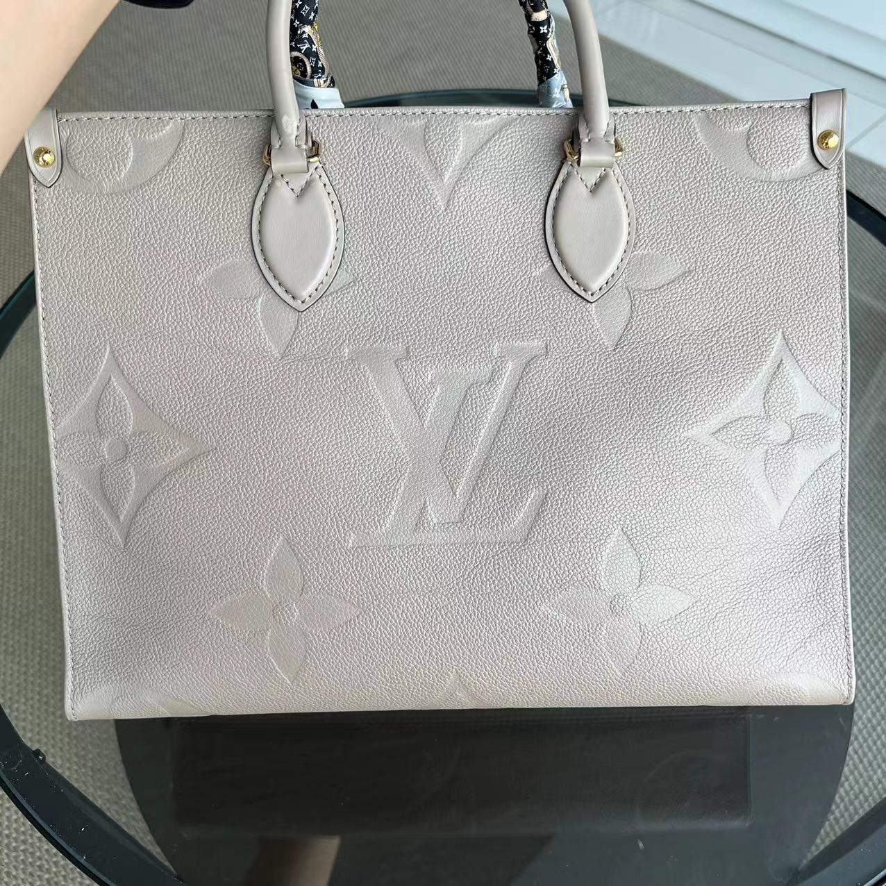 Kovancy OnTheGo MM On The Go Monogram Empreinte Tourterelle Gris