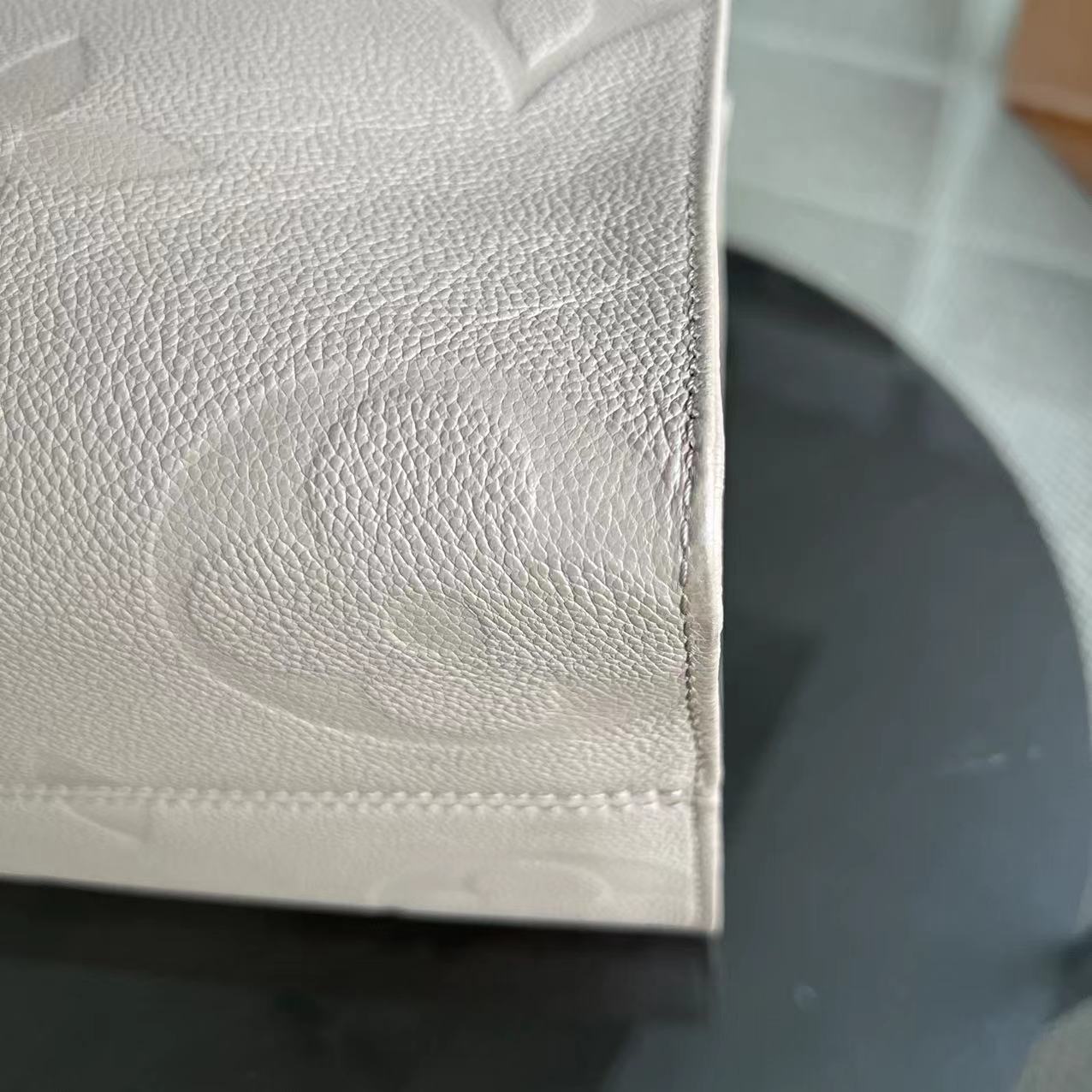 Kovancy OnTheGo MM On The Go Monogram Empreinte Tourterelle Gris