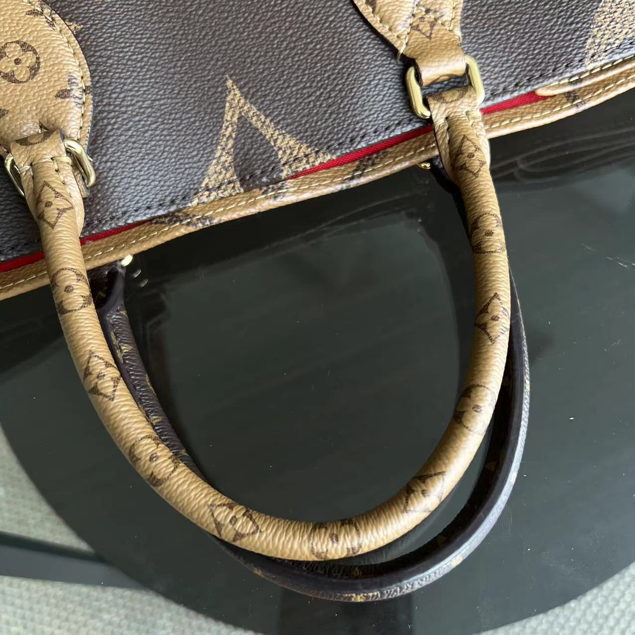 LVT OnTheGo - Monogram Canvas MM