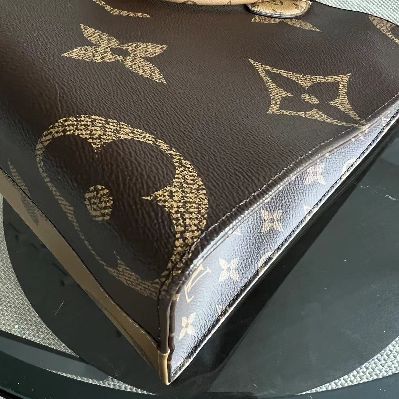 LVT OnTheGo - Monogram Canvas MM