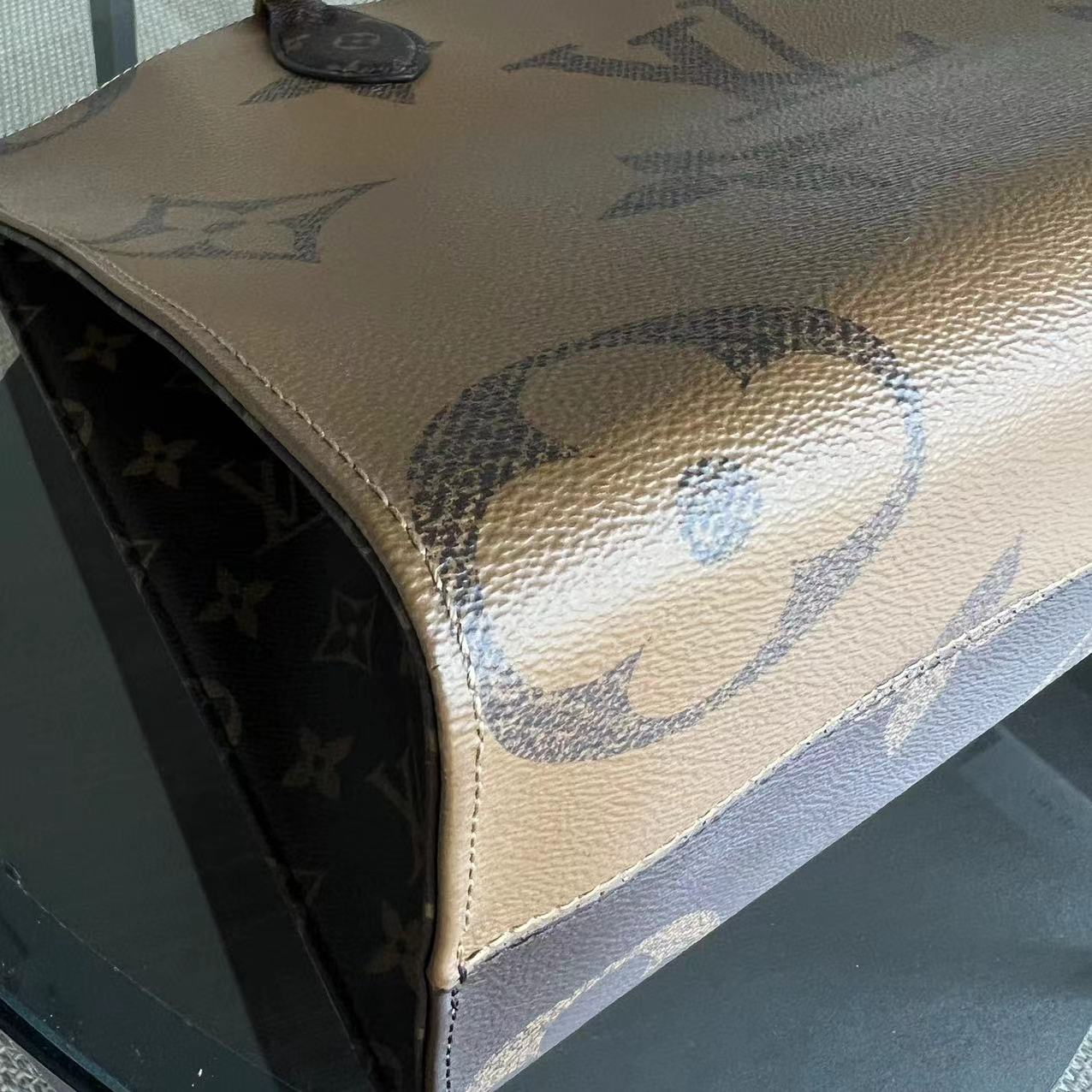 LVT OnTheGo - Monogram Canvas MM