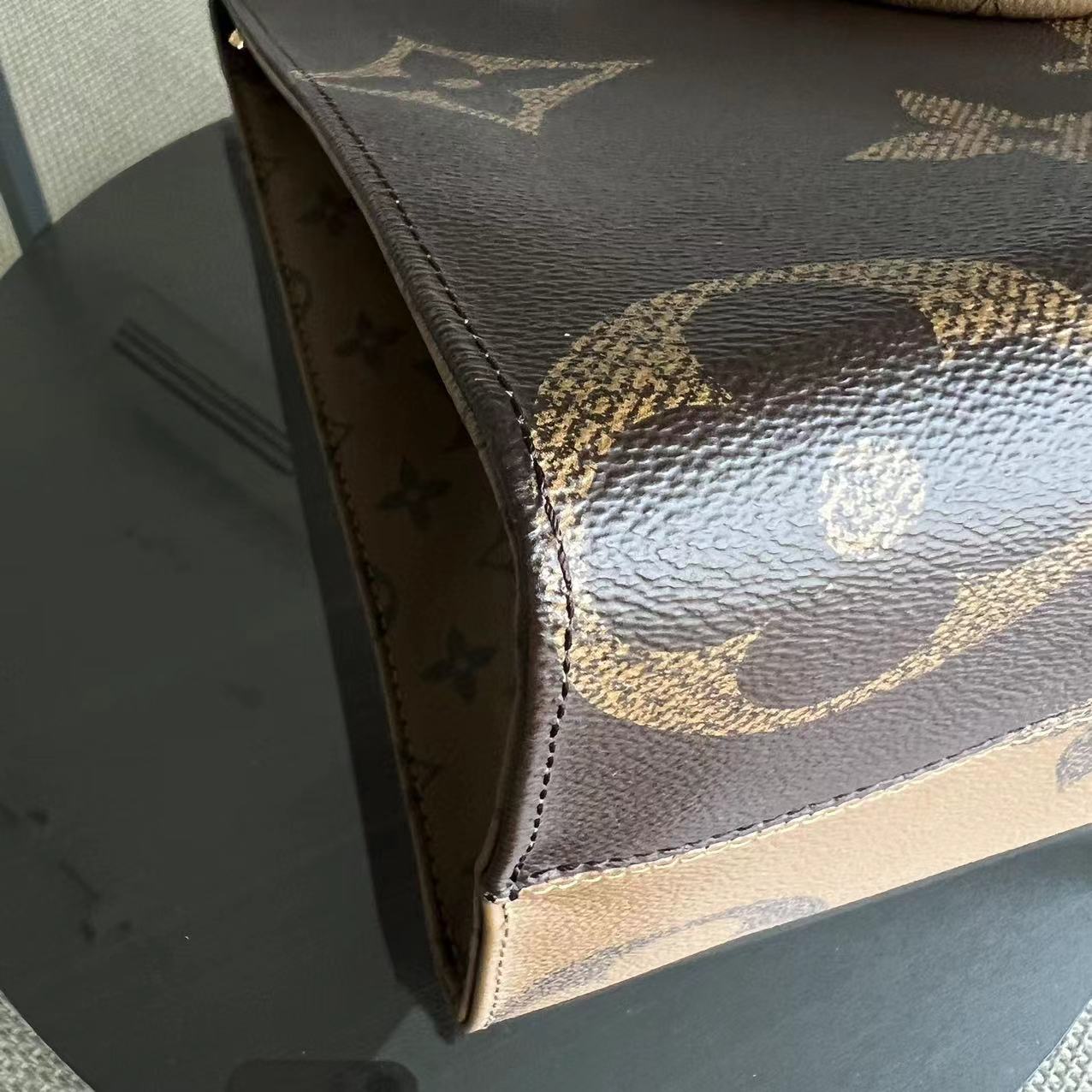 LVT OnTheGo - Monogram Canvas MM